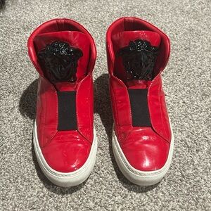 HELD until 9/4/24. Red Versace sneaker size 38 (7.5 us)